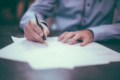Man signing a Power Purchase Agreement