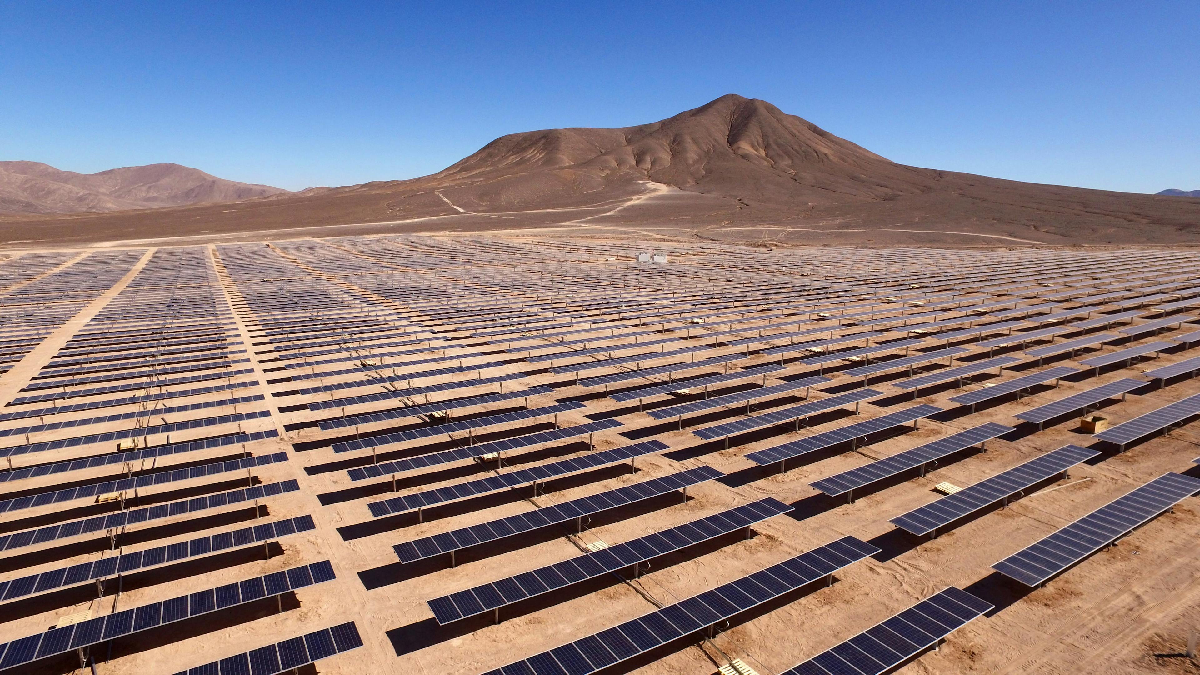 A utility scale solar farm in a desert.